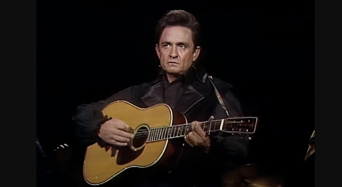 Which 'Man in Black' set the airwaves ablaze with his 1963 classic 'Ring of Fire'?